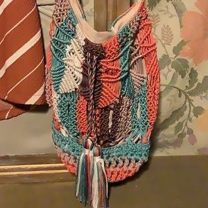 Straw bag with long strap for crossbody wear